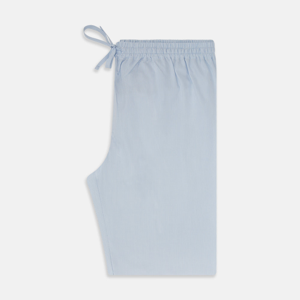 Turnbull & Asser’s Pale Blue Micro Check Pyjama Trousers feature an elastic waistband with drawstring for comfort, making these light blue sleepwear pants ideal for relaxing and sleeping.