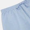 View 2 of product The Blue Prince of Wales Check Pyjama Trousers by Turnbull & Asser, featuring a subtle check pattern, elastic waistband, and drawstring tie, are laid flat on a white background.