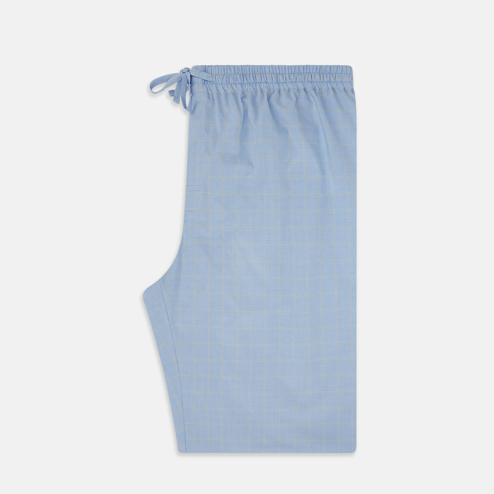 The Blue Prince of Wales Check Pyjama Trousers by Turnbull & Asser, featuring a subtle check pattern, elastic waistband, and drawstring tie, are laid flat on a white background.