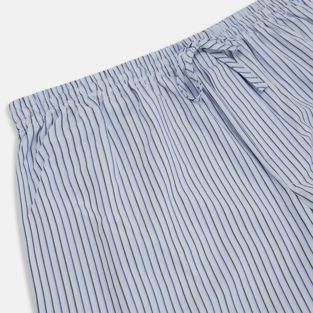 Turnbull & Asser Blue Shadow Pinstripe Pyjama Trousers, featuring blue and white vertical stripes and an elastic waistband, are displayed flat on a white background.