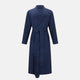 A navy and white polka dot gown with rolled hems in luxurious silk from Turnbull & Asser UK evokes the timeless elegance of classic gentlemen’s nightwear. Displayed on a plain white background, this robe offers both comfort and style, reminiscent of refined evenings at home.