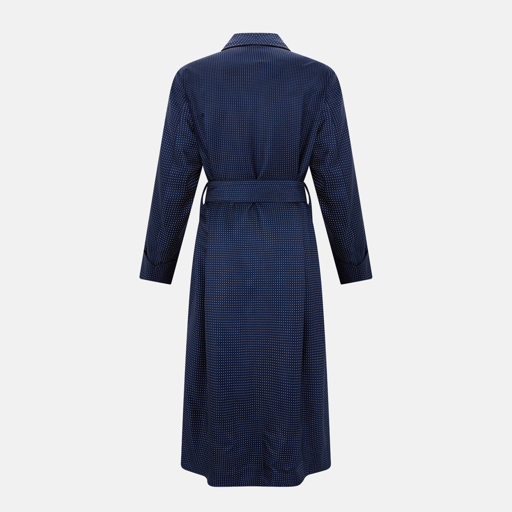 A navy and white polka dot gown with rolled hems in luxurious silk from Turnbull & Asser UK evokes the timeless elegance of classic gentlemen’s nightwear. Displayed on a plain white background, this robe offers both comfort and style, reminiscent of refined evenings at home.
