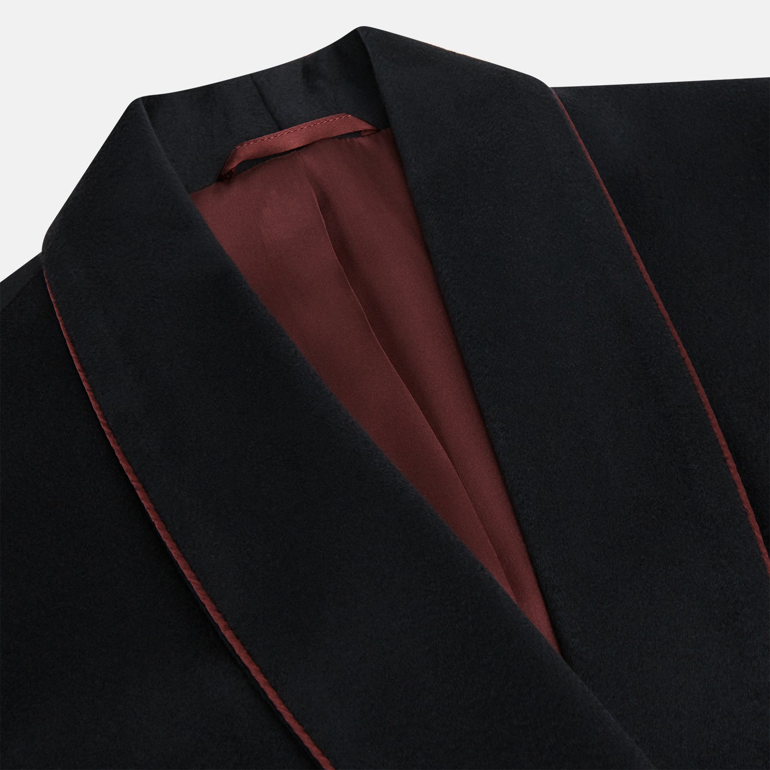 View 2 of product The Navy and Red Piped Cashmere Gown by Turnbull & Asser features a belted navy silhouette with red contrast piping, wide lapels, chest pocket, and two side pockets, shown on a plain white background.