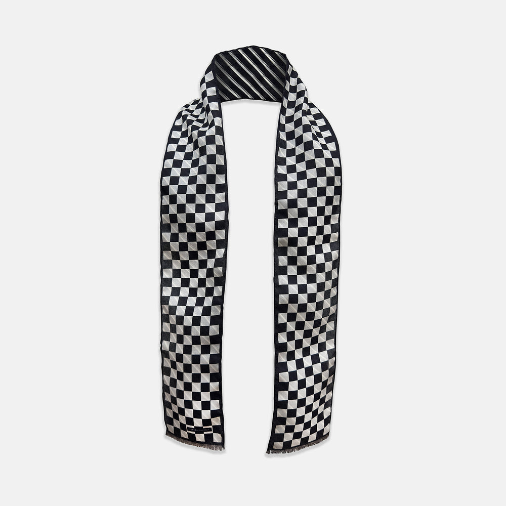 The Chequered Navy on Navy Frame Small Scarf in Silk from Turnbull & Asser UK, showcasing a sophisticated navy checkerboard pattern, is displayed against a plain white background.