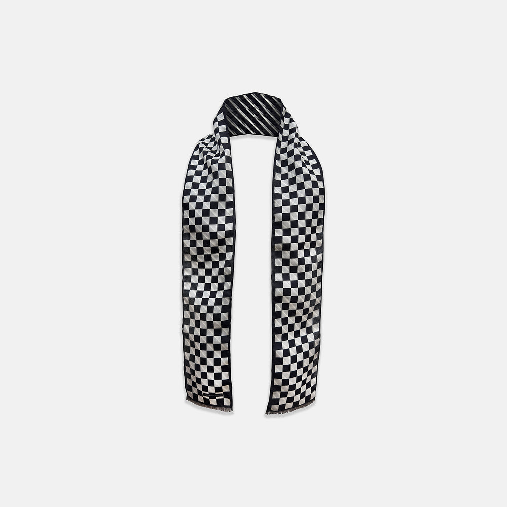 The Chequered Navy on Navy Frame Small Scarf in Silk from Turnbull & Asser UK, showcasing a sophisticated navy checkerboard pattern, is displayed against a plain white background.