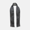 View 2 of product The Chequered Navy on Navy Frame Small Scarf in Silk from Turnbull & Asser UK, showcasing a sophisticated navy checkerboard pattern, is displayed against a plain white background.