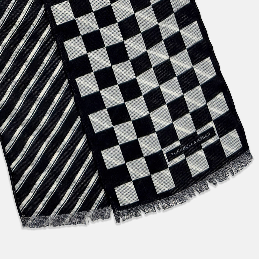 The Chequered Navy on Navy Frame Small Scarf in Silk from Turnbull & Asser UK, showcasing a sophisticated navy checkerboard pattern, is displayed against a plain white background.