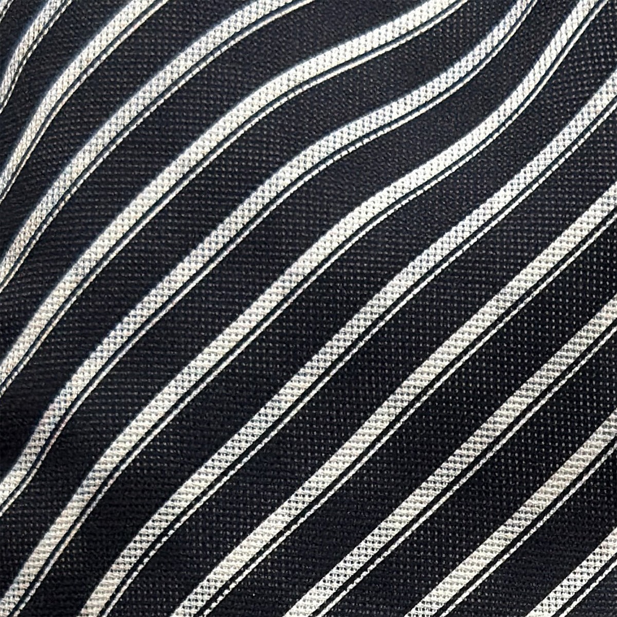 View 4 of product The Chequered Navy on Navy Frame Small Scarf in Silk from Turnbull & Asser UK, showcasing a sophisticated navy checkerboard pattern, is displayed against a plain white background.