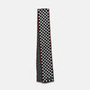 View 3 of product Introducing the Chequered Navy on Red Frame Small Scarf in Silk by Turnbull & Asser UK—a luxurious silk accessory featuring a navy and white chequered pattern, accented with thin red borders and delicate fringe at each end. Displayed against a white background, this scarf pays homage to British motoring heritage and the enduring elegance of Concours style.