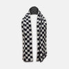 View 1 of product A Chequered Navy on White Frame Large Scarf in Silk from Turnbull & Asser UK, featuring a striking navy and white checkerboard motif inspired by classic British motoring heritage, is gracefully displayed over an invisible stand with its ends cascading downward and the top artfully folded into a striped semicircle—an impeccable choice for making a stylish statement at the Concours of Elegance 2026.