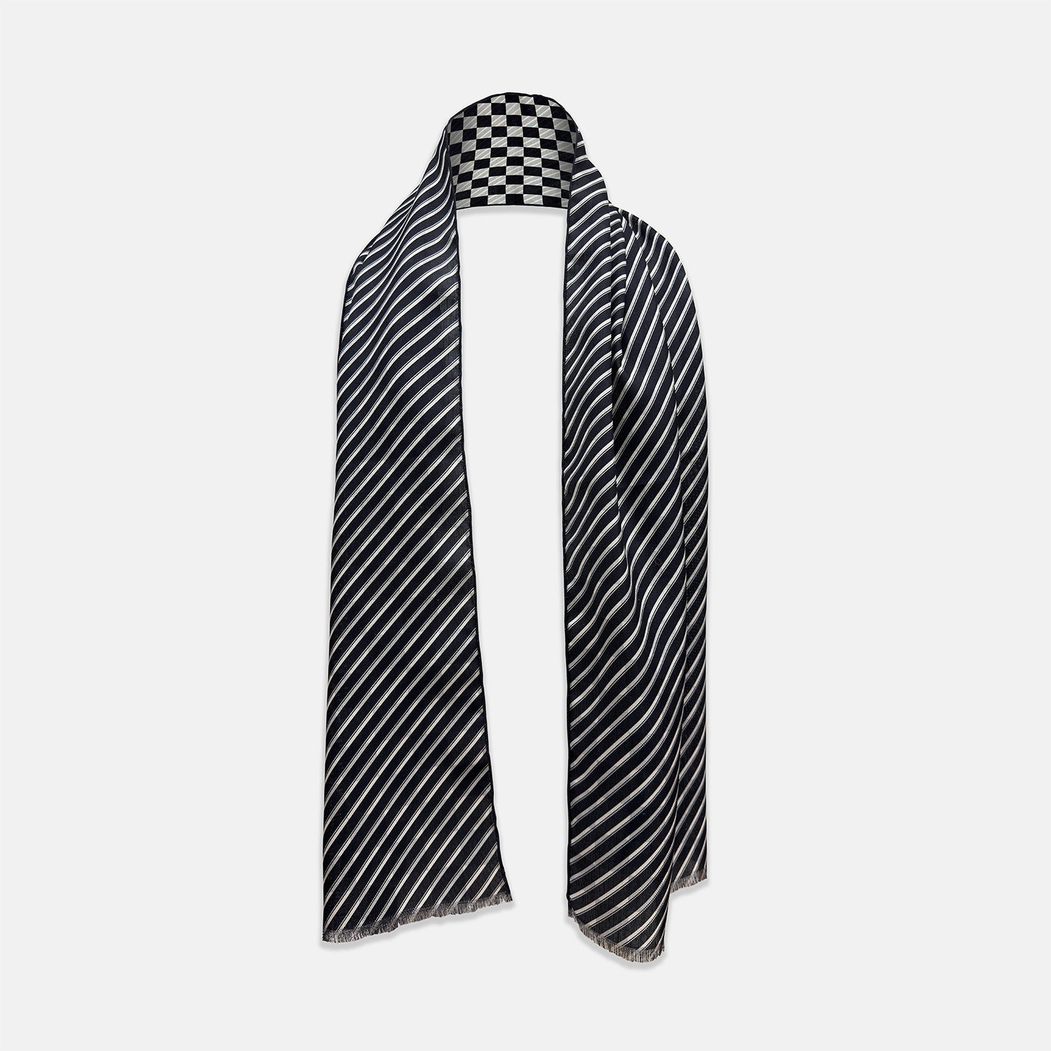 View 2 of product A Chequered Navy on Navy Frame Large Scarf in Silk by Turnbull & Asser UK, featuring a navy checkered design with striped detailing at the neck, is elegantly displayed against a plain white background—an accessory inspired by the enduring sophistication of British motoring, perfect for occasions such as the Concours of Elegance 2026.