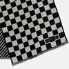 View 3 of product A Chequered Navy on Navy Frame Large Scarf in Silk by Turnbull & Asser UK, featuring a navy checkered design with striped detailing at the neck, is elegantly displayed against a plain white background—an accessory inspired by the enduring sophistication of British motoring, perfect for occasions such as the Concours of Elegance 2026.