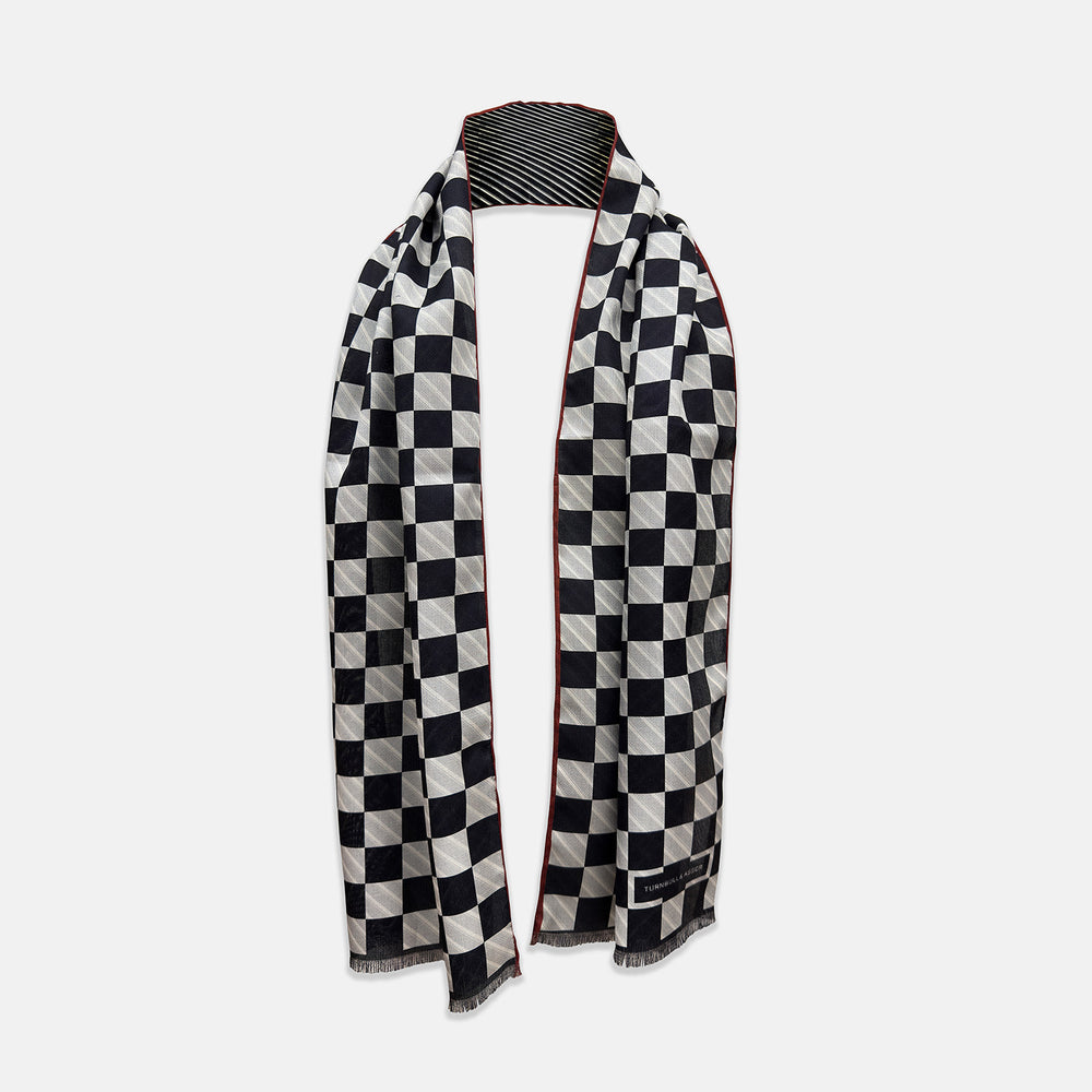 Chequered Navy on Red Frame Large Scarf in Silk by Turnbull & Asser UK, featuring a classic navy and white checkered pattern with a bold red border, elegantly displayed with both ends draped down to reveal the contrasting striped neck detail—a sophisticated nod to British motoring style, perfect for elevating your Concours of Elegance 2026 attire.