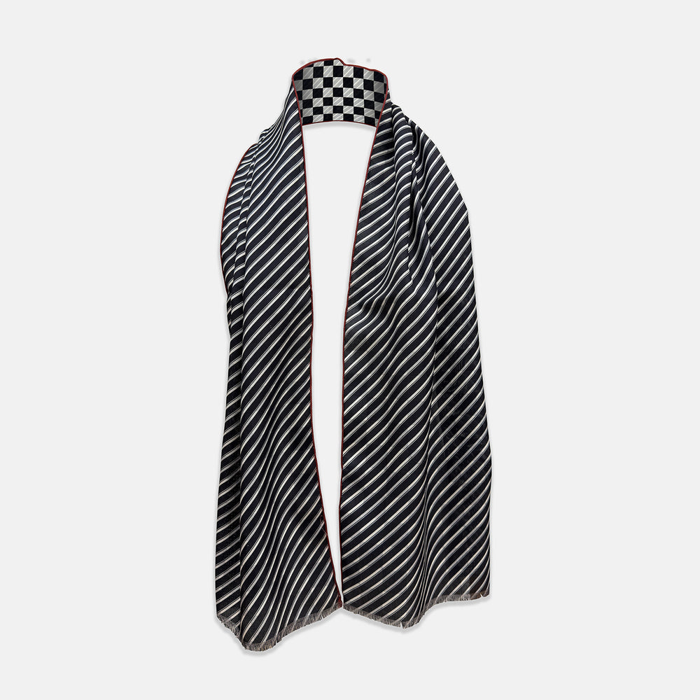 Chequered Navy on Red Frame Large Scarf in Silk by Turnbull & Asser UK, featuring a classic navy and white checkered pattern with a bold red border, elegantly displayed with both ends draped down to reveal the contrasting striped neck detail—a sophisticated nod to British motoring style, perfect for elevating your Concours of Elegance 2026 attire.