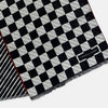 View 3 of product Chequered Navy on Red Frame Large Scarf in Silk by Turnbull & Asser UK, featuring a classic navy and white checkered pattern with a bold red border, elegantly displayed with both ends draped down to reveal the contrasting striped neck detail—a sophisticated nod to British motoring style, perfect for elevating your Concours of Elegance 2026 attire.