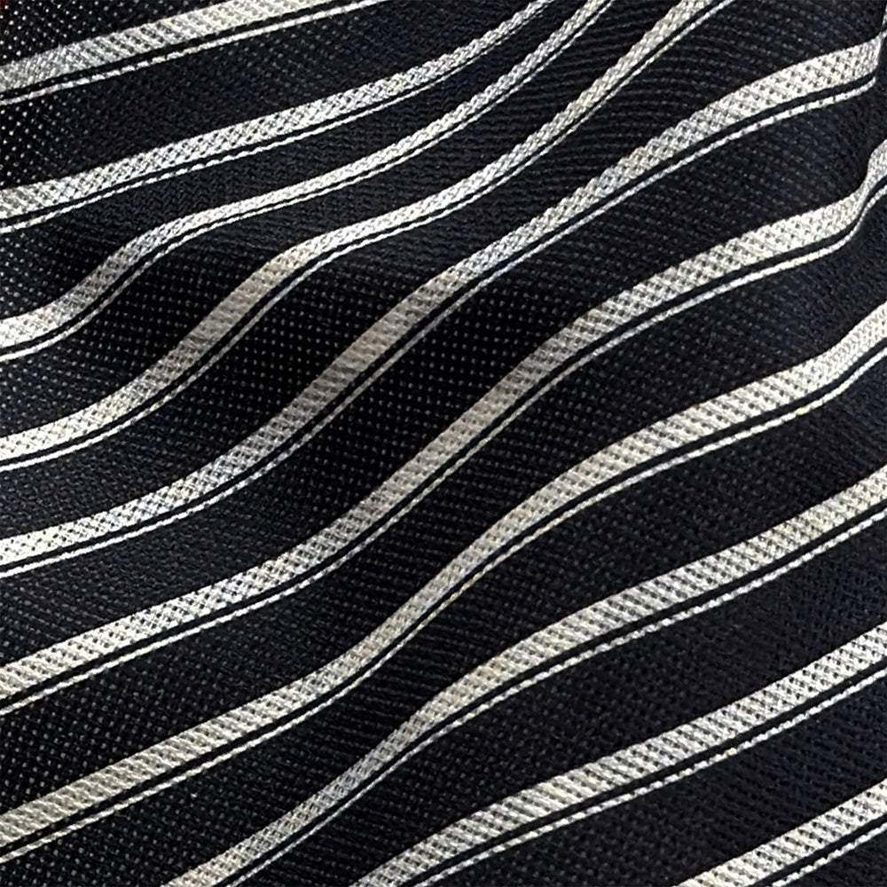 Chequered Navy on Red Frame Large Scarf in Silk by Turnbull & Asser UK, featuring a classic navy and white checkered pattern with a bold red border, elegantly displayed with both ends draped down to reveal the contrasting striped neck detail—a sophisticated nod to British motoring style, perfect for elevating your Concours of Elegance 2026 attire.