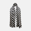 View 1 of product A Chequered Navy & White Scarf in Silk by Turnbull & Asser UK is displayed against a plain white background, showcasing its long, luxurious silk fabric with a striking navy and white checkered pattern.