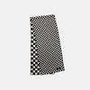 View 4 of product A Chequered Navy & White Scarf in Silk by Turnbull & Asser UK is displayed against a plain white background, showcasing its long, luxurious silk fabric with a striking navy and white checkered pattern.