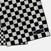 View 3 of product A Chequered Navy & White Scarf in Silk by Turnbull & Asser UK is displayed against a plain white background, showcasing its long, luxurious silk fabric with a striking navy and white checkered pattern.