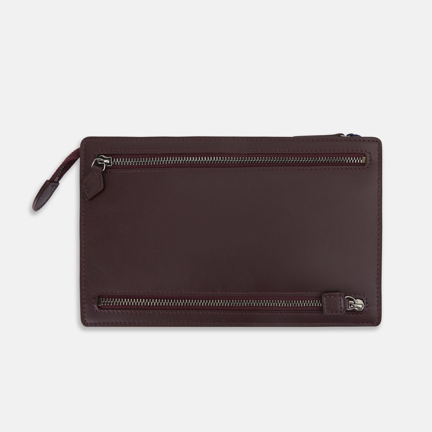 View 3 of product The Turnbull & Asser UK Burgundy Leather Zip Envelope Pouch features two horizontal zipper compartments with matching leather pulls, making it a stylish travel accessory or passport holder.