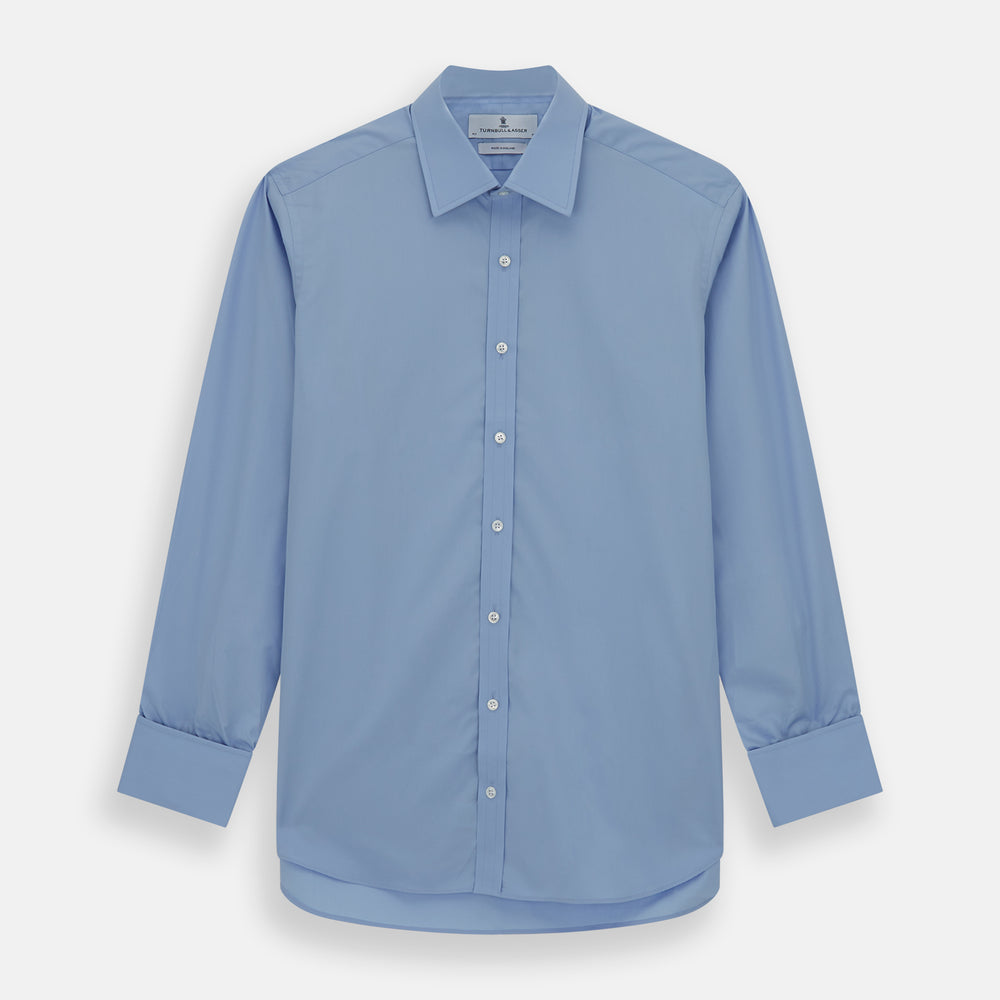The Turnbull & Asser Blue Cotton Shirt with T&A collar and double cuffs is displayed neatly on a white background—ideal for pairing with a navy suit for a sharp, sophisticated look.