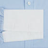 View 3 of product Turnbull & Asser Light Blue End-on-End Shirt features a contrast T&A white collar, double cuffs, long sleeves, and button-down front. Displayed on a plain white background.