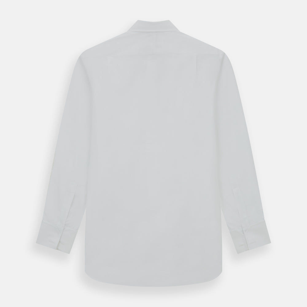 The Turnbull & Asser Casino Royale White Dress Shirt, as seen on James Bond, features long sleeves, a button-down front, and classic collar and cuffs. Displayed against a plain white background.