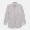 View 1 of product The Turnbull & Asser Burgundy Track Stripe Winston Shirt features long sleeves, classic collar, buttoned cuffs, and vertical white and dark maroon stripes—perfect for formal wear and shown laid flat against a white background.