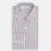 View 5 of product The Turnbull & Asser Burgundy Track Stripe Winston Shirt features long sleeves, classic collar, buttoned cuffs, and vertical white and dark maroon stripes—perfect for formal wear and shown laid flat against a white background.