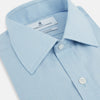 View 2 of product The Turnbull & Asser Blue Cotton Cashmere Mayfair Shirt features long sleeves, a classic collar, buttoned cuffs, and white buttons, shown against a white background.