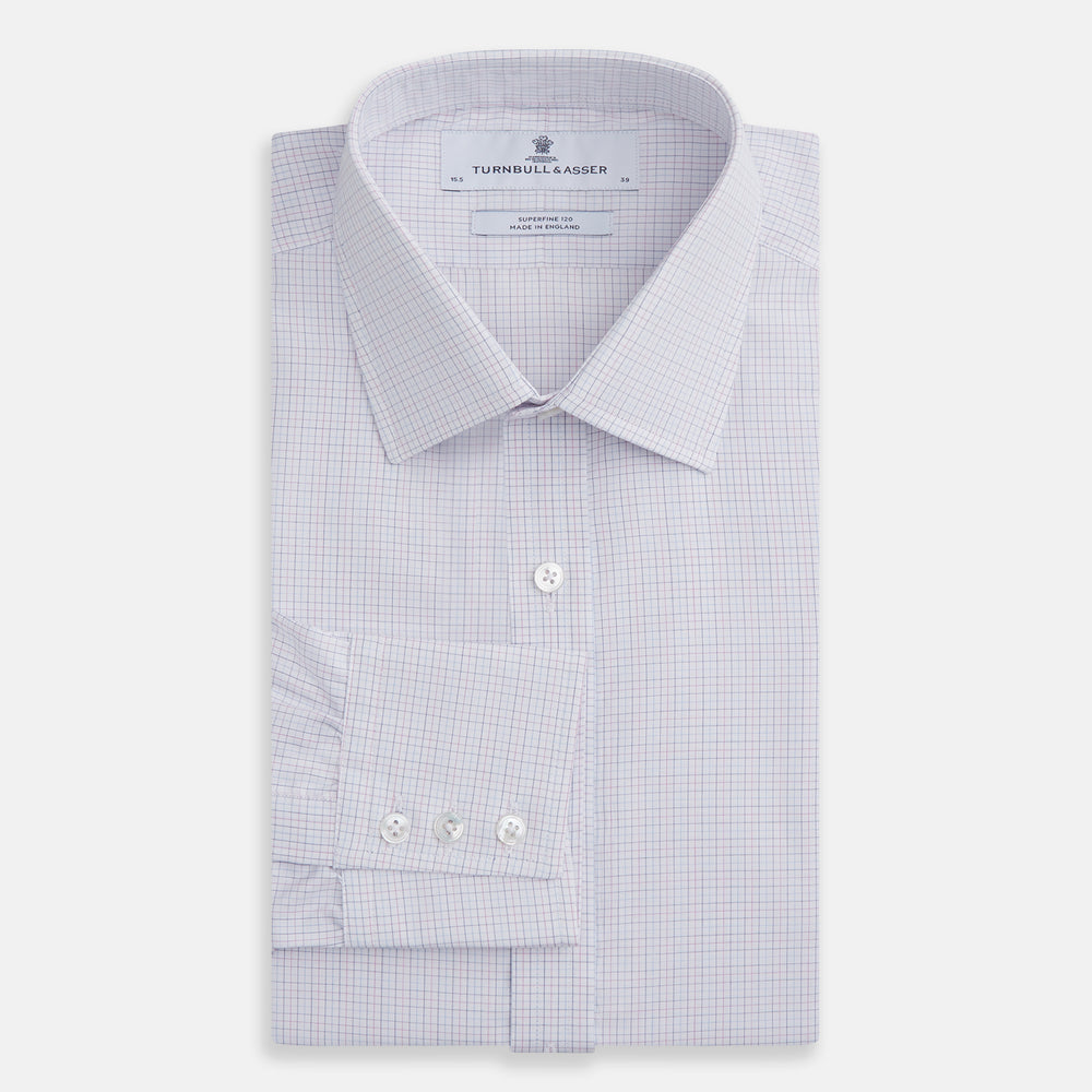 The Turnbull & Asser Red and Blue Tattersall Check Mayfair Shirt features long sleeves, cotton poplin fabric, a pointed collar, and buttoned cuffs, displayed flat on a white background.