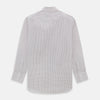View 5 of product The Turnbull & Asser Red and Navy Graph Check Mayfair Shirt is a long-sleeved organic cotton button-up featuring a collar, buttoned cuffs, and a small red and navy check pattern, shown against a plain white background.