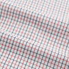 View 6 of product The Turnbull & Asser Red and Navy Graph Check Mayfair Shirt is a long-sleeved organic cotton button-up featuring a collar, buttoned cuffs, and a small red and navy check pattern, shown against a plain white background.