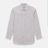 View 1 of product The Turnbull & Asser Red and Navy Graph Check Mayfair Shirt is a long-sleeved organic cotton button-up featuring a collar, buttoned cuffs, and a small red and navy check pattern, shown against a plain white background.