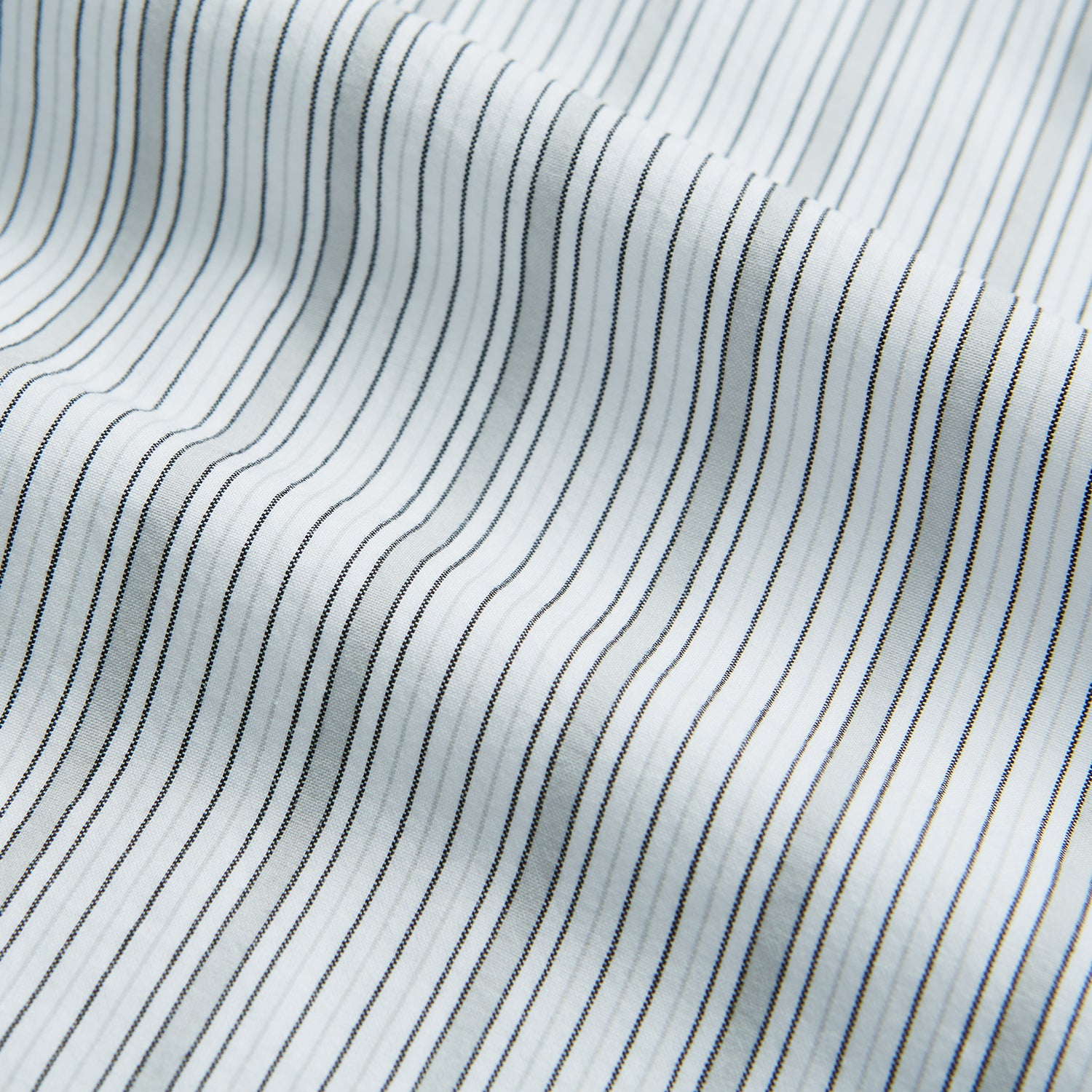View 5 of product Grey Fine Track Stripe Mayfair Shirt by Turnbull & Asser, featuring breathable cotton with a T&A collar and buttoned cuffs, shown laid flat on a white background.