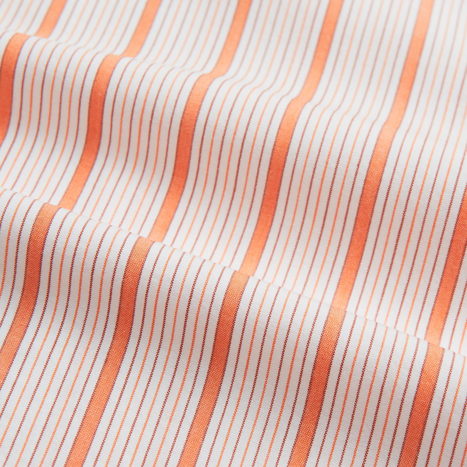 View 5 of product Turnbull & Asser's Orange Multi Track Stripe Pyjama Trousers feature vertical stripes, an elastic waistband, and a drawstring tie—ideal for comfort lovers. Displayed flat on a plain white background.