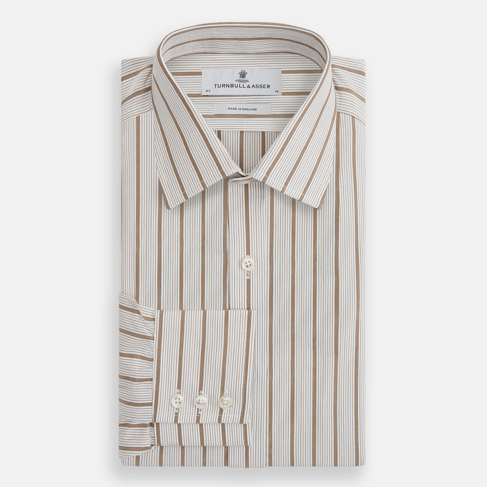 The Brown Multi Track Stripe Mayfair Shirt by Turnbull & Asser is a long-sleeved, collared, button-up in organic cotton with vertical brown and white stripes, classic fit, cuffs, and timeless style—shown on a plain white background.