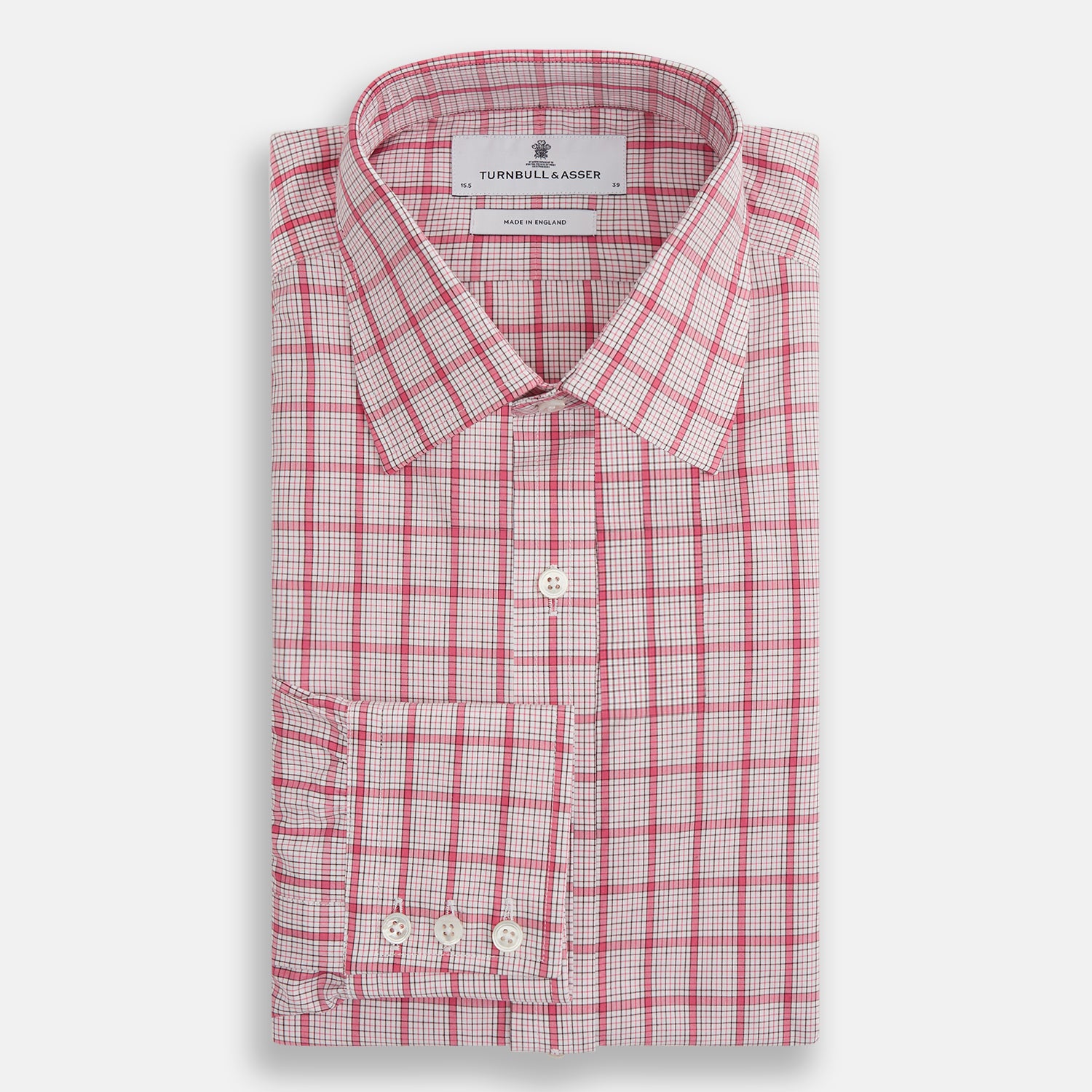 View 4 of product The Turnbull & Asser Pink Graph Overlay Check Mayfair Shirt features a classic collar, long sleeves, and a pink check pattern. Crafted from organic cotton, it is showcased against a plain white background.