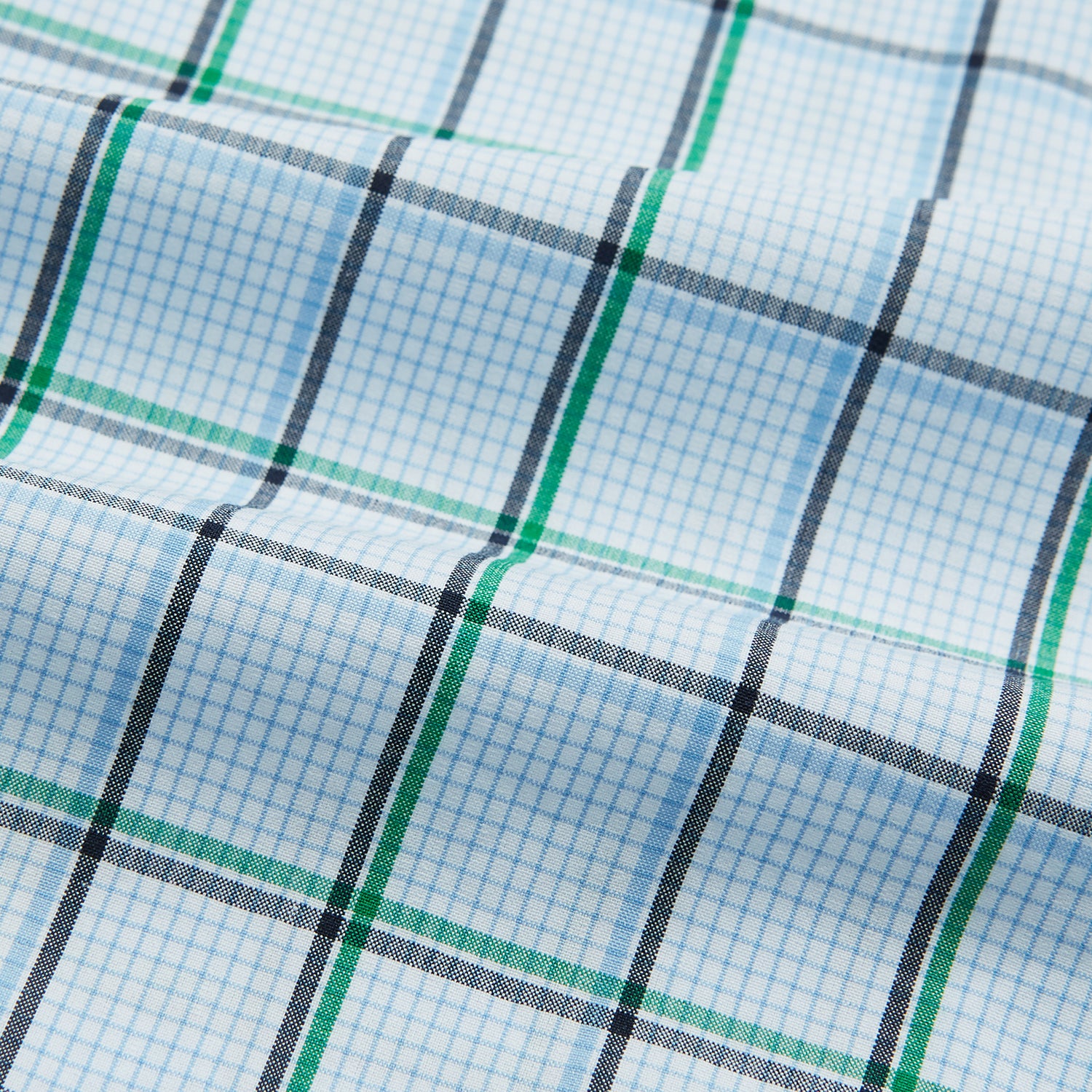 View 5 of product Turnbull & Asser Blue and Green Tattersall Check Pyjama Trousers with elastic waistband and drawstring, featuring a simple straight-leg design, shown laid flat on a white background.