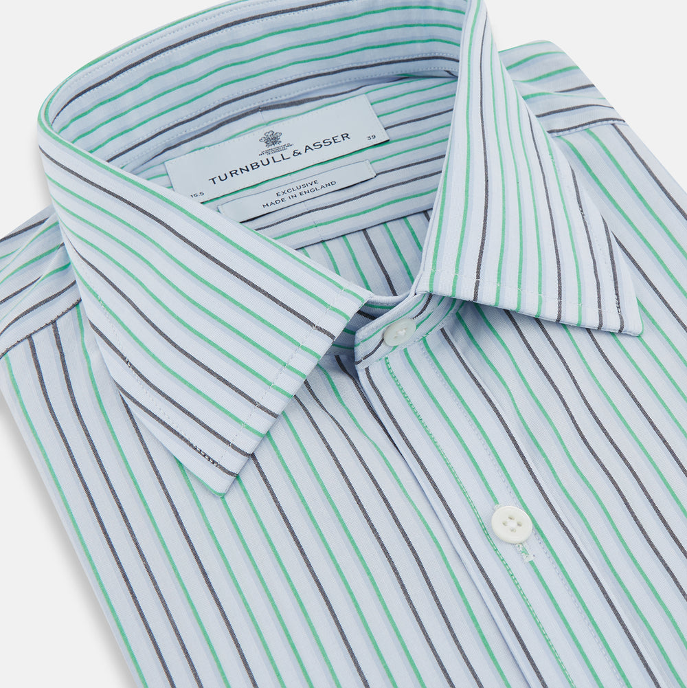 The Green and Blue Shadow Pinstripe Mayfair Shirt by Turnbull & Asser features long sleeves, a pointed collar, white buttons, and subtle green and blue pinstripes—a refined choice for any wardrobe capsule.