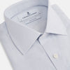 View 2 of product The Turnbull & Asser Blue Fine Graph Check Mayfair Shirt, made from breathable cotton, features long sleeves, a T&A collar, white buttons, and buttoned cuffs, displayed flat on a white background.