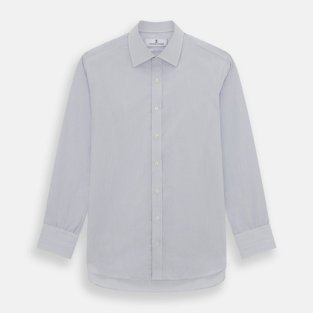 The Turnbull & Asser Blue Fine Graph Check Mayfair Shirt, made from breathable cotton, features long sleeves, a T&A collar, white buttons, and buttoned cuffs, displayed flat on a white background.
