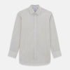 View 1 of product The Turnbull & Asser Pale Blue Graph Check Mayfair Shirt is a long-sleeve, button-up shirt with a pointed collar and buttoned cuffs, crafted from organic cotton—shown here laid flat on a white background.