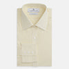View 4 of product The Turnbull & Asser Yellow Graph Check Mayfair Shirt features long sleeves, a button-up front, and classic T&A collar in organic cotton with a light yellow check pattern—a summer staple shown on a plain white background.