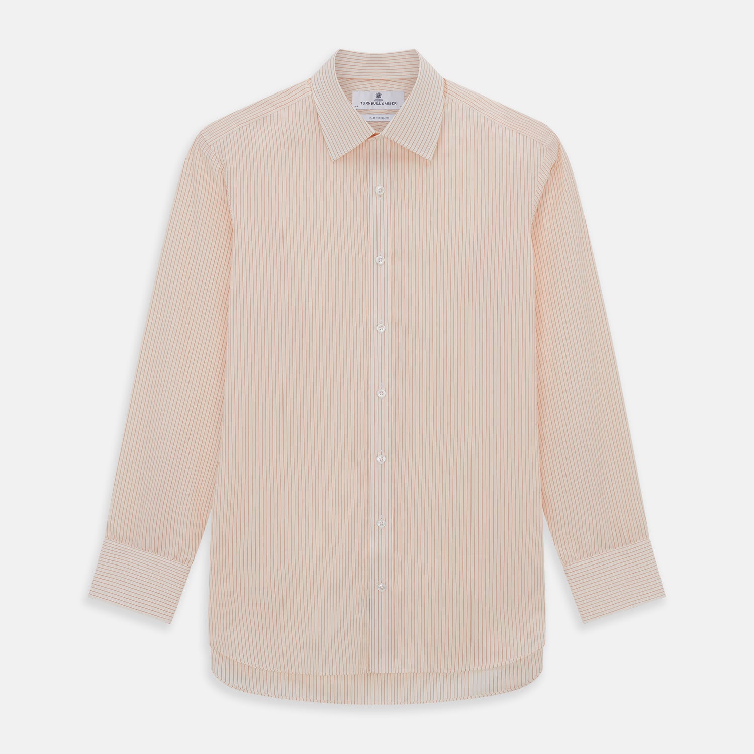 View 1 of product The Turnbull & Asser Orange Pinstripe Mayfair Shirt with a T&A collar and thin peach and white stripes is laid flat on a white background.