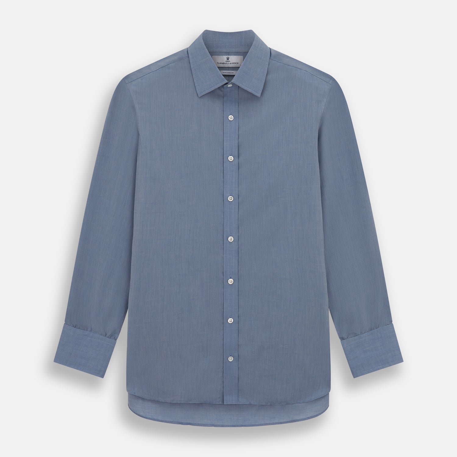 View 1 of product The Blue Mayfair Shirt by Turnbull & Asser is a long-sleeve, textured blue shirt with a classic T&A collar and white buttons, crafted from organic cotton and shown against a plain white background.