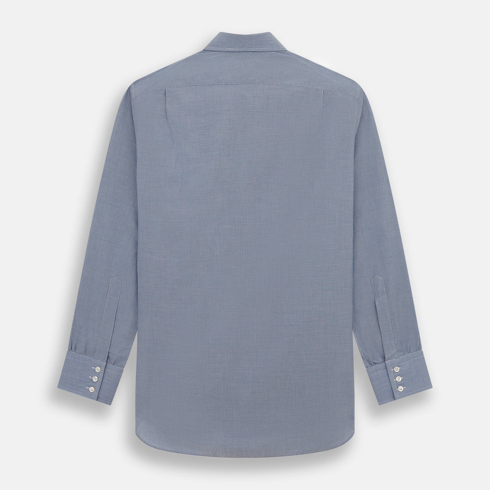 The Turnbull & Asser Blue Pencil Stripe Mayfair Shirt is crafted from organic cotton with a classic collar, white buttons, and buttoned cuffs. Shown laid flat on a white background.