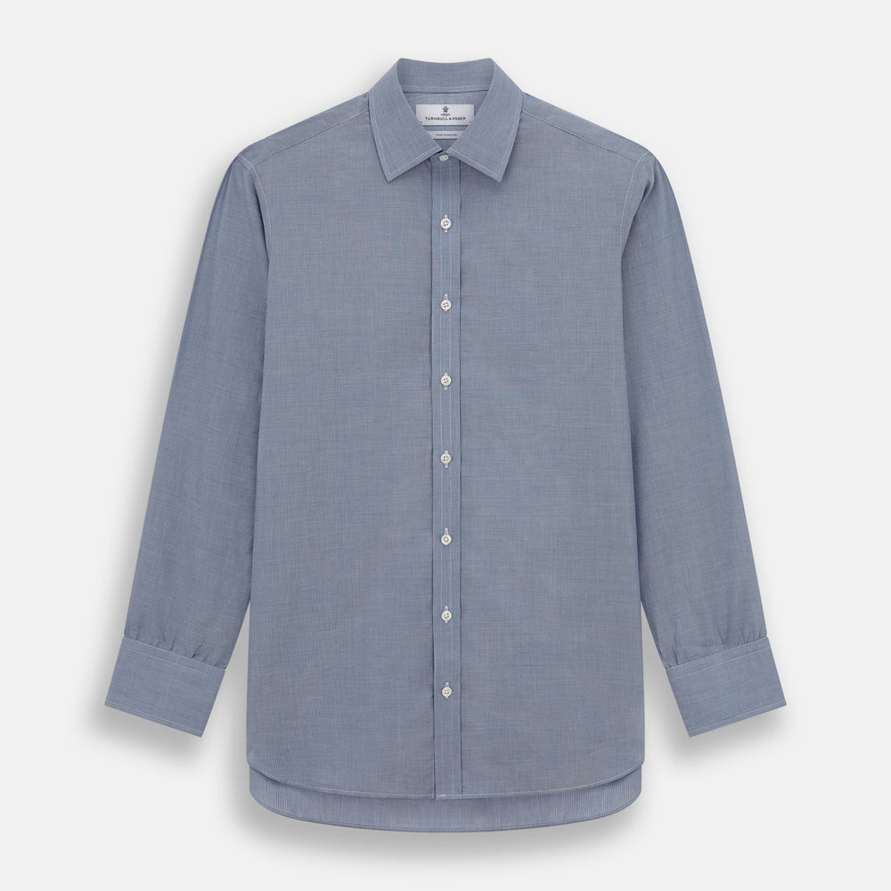 The Turnbull & Asser Blue Pencil Stripe Mayfair Shirt is crafted from organic cotton with a classic collar, white buttons, and buttoned cuffs. Shown laid flat on a white background.