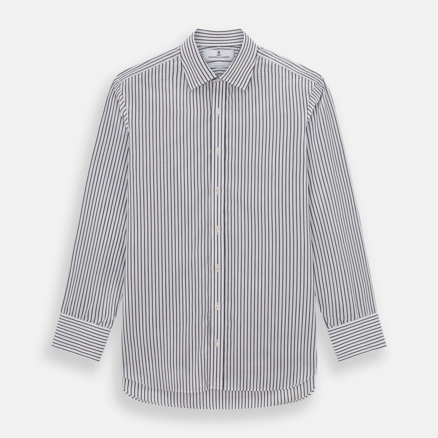 View 1 of product The Turnbull & Asser Midnight Blue Halo Stripe Mayfair Shirt features breathable cotton with black and white vertical stripes, a pointed T&A collar, and buttoned cuffs, displayed flat on a white background.