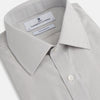 View 2 of product The Turnbull & Asser Pale Blue Fine Stripe Mayfair Shirt features a classic collar, white buttons, cuffs, a slightly curved hem, and subtle pale blue stripes for a formal tailored look. Displayed on a plain white background.